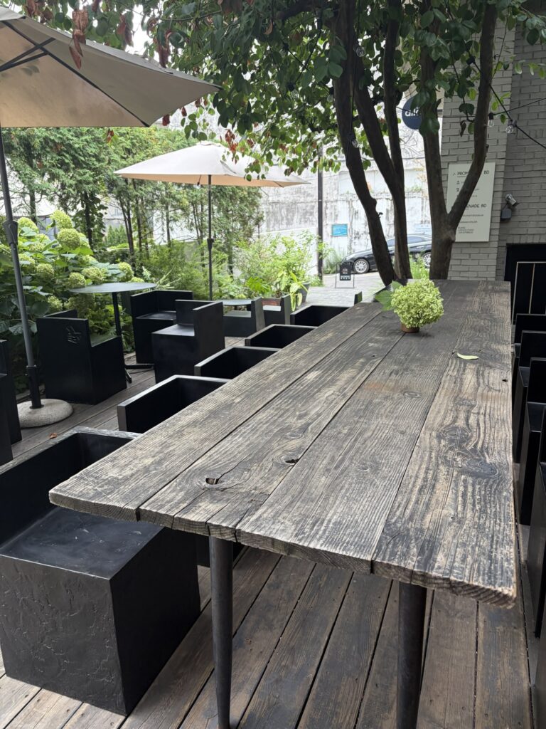 Outdoor garden seating with sedge grasses at Hannam Workshop cafe, Hannam-dong, Seoul.