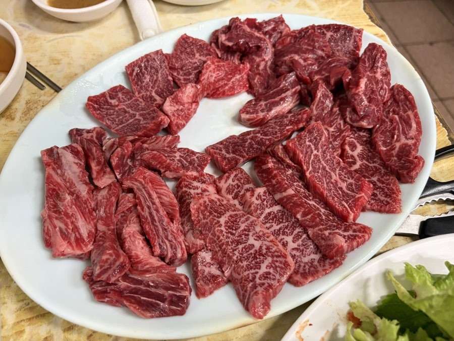 Raw marbled Hanwoo Korean beef platter at Hoseong restaurant